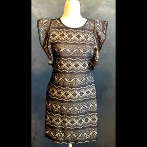 Paper doll black and cream colored dress
